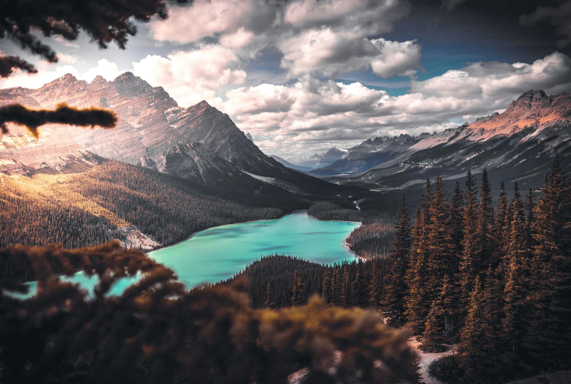 A still mountain lake reflecting the surrounding landscape